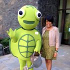 IMAGE: Mayor Rawlings-Blake poses with Turtle, mascot of the Growing Green Initiative